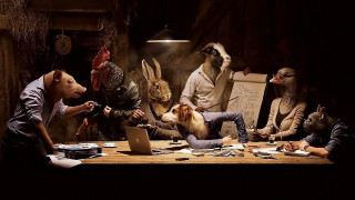 People animals dog table laptop - a group of people sitting free wallpaper