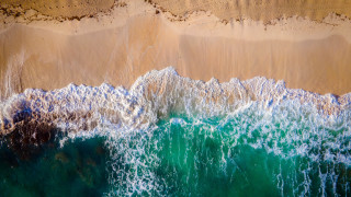 Beach waves sand ocean tilt - a sandy beach free wallpaper