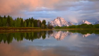 Mountain reflection lake forest sky 3 - a cloudy sky in the background free wallpaper