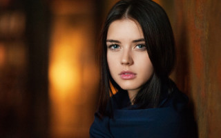 Woman blueeyes blackcoat portrait blurry - a woman free wallpaper