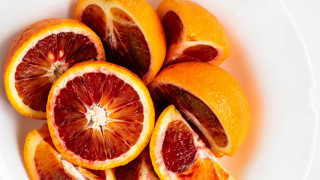 White plate sliced oranges table - top of a table next free wallpaper