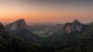 Mountain range sunset valley trees - panoramic free wallpaper for desktop