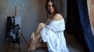 Woman sitting white dress painting - a painting behind her free wallpaper