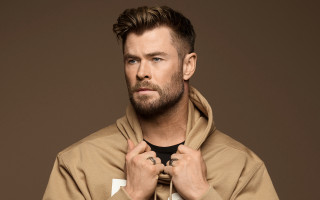 Man in brown hoodie tying - tom of finland free wallpaper