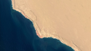 Aerial beach plane ocean sunset - over a beach free wallpaper