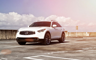 White infiniti parking lot clouds - a parking lot free wallpaper