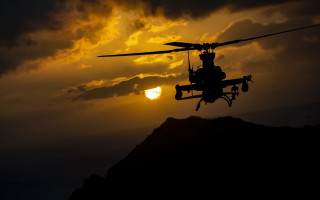 Helicopter sunset clouds cityscape mountain - the sun in the background free wallpaper