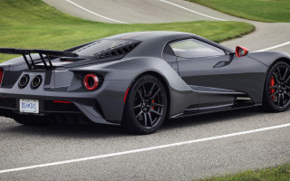 Grey sports car winding road - side profile free wallpaper