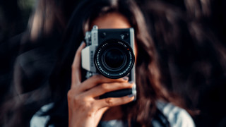 Woman camera blowing hair art - a camera in front free wallpaper