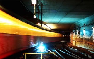 Train tunnel loading platform lights - long exposure free wallpaper