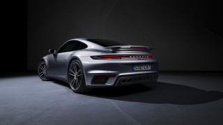 Silver porsche dark room spotlight - the back of the car free wallpaper