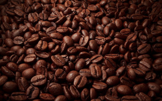 Coffee beans hyperrealism dark background - a pile of coffee beans free wallpaper