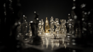 Chess glass pieces cityscape bokeh - a chess board free wallpaper