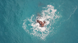 Ocean floating boat people aerial - ann thetis blacker free wallpaper
