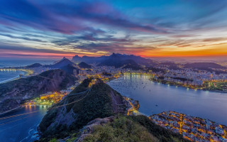 Sunset city water mountains background - arthur quartley free wallpaper