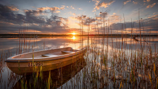 Small boat lake sunset bridge - the sun setting free wallpaper