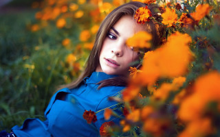 Woman laying flower field autumn - a field of flowers free wallpaper