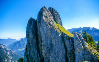 Mountain rock formation trees bridge - a large rock formation in the middle of it free wallpaper