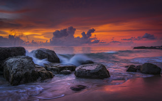 Sunset ocean rocks mountain mystical - a sunset over the ocean free wallpaper