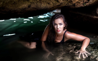 Woman black bikini cave water - portrait photography free wallpaper