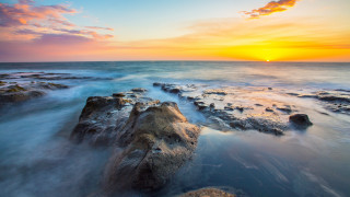 Sunset ocean rocks orange sky - orange sky above free wallpaper