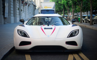 White sports car parking lot 30 - a parking lot next free wallpaper