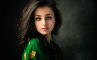Woman green shirt black background - a half free wallpaper