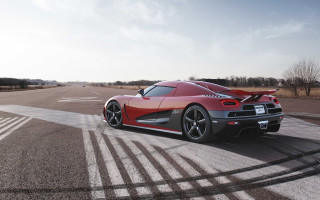 Red sports car driving road 4 - a road next free wallpaper