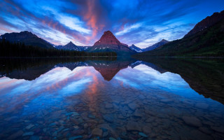 Mountain reflection sunset colorful sky 5 - a mountain range in the distance free wallpaper