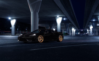 Black sports car night parking - a parking lot free wallpaper
