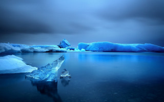 Large iceberg lake cloudy sky - iceberg free wallpaper
