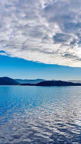 Boat water cloudy sky mountains 3 - cloudy free wallpaper