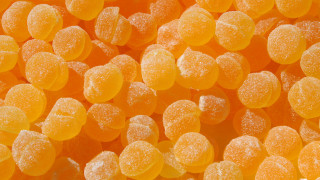 Orange candies sugar white background - verdadism free wallpaper