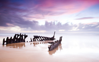 Beach wooden structures cloudy sky - cloudy free wallpaper