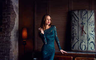 Woman blue dress smoking clock - a cigarette in front free wallpaper