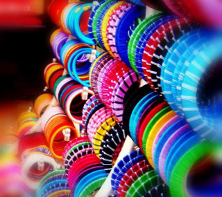 Colorful discs stacked row table - a blurry background free wallpaper
