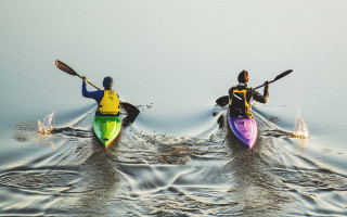 Kayaks paddling lake people raising - two person free wallpaper