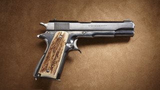 Wooden handle gun brown background - a wooden handle free wallpaper