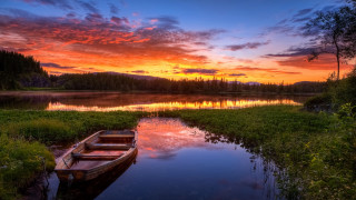 Lake sunset boat landscape sky - the shore of a lake free wallpaper