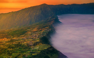 Mountain valley city fog lake - a valley below free wallpaper