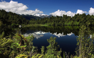 Lake trees mountains boat clouds - tree and mountains free wallpaper