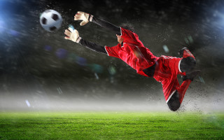 Soccer player red uniform kicking - athletic free wallpaper