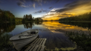 Docked boat lake sunset clouds - a colorful sky free wallpaper