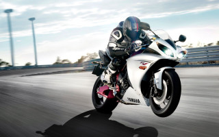 Motorcycle rider road fence building - a person riding free wallpaper
