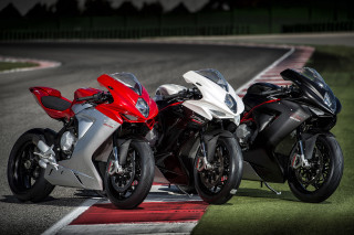 Three motorcycles race track night - the other free wallpaper