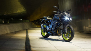 Motorcycle parked sidewalk building night - night free wallpaper
