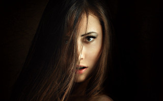 Woman long hair serious portrait - her face free wallpaper for desktop