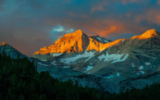 Mountain range sunset clouds trees 6 - dramatic free wallpaper