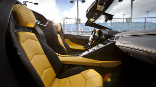 Car yellow black seats sky - a stadium free wallpaper