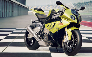 Yellow motorcycle checkered floor race - a yellow motorcycle free wallpaper